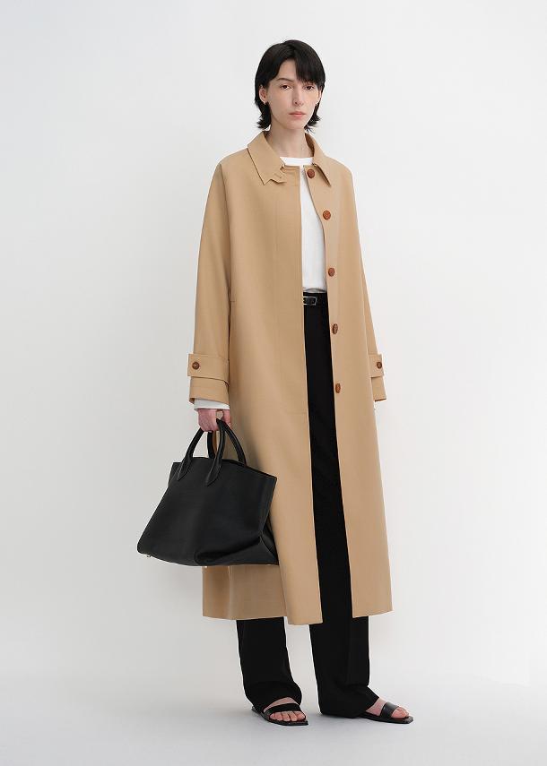 Firelady Sheepskin wool coat from Maison Beaumont, showing a stylish, tailored wool coat with a smooth texture and classic design.
