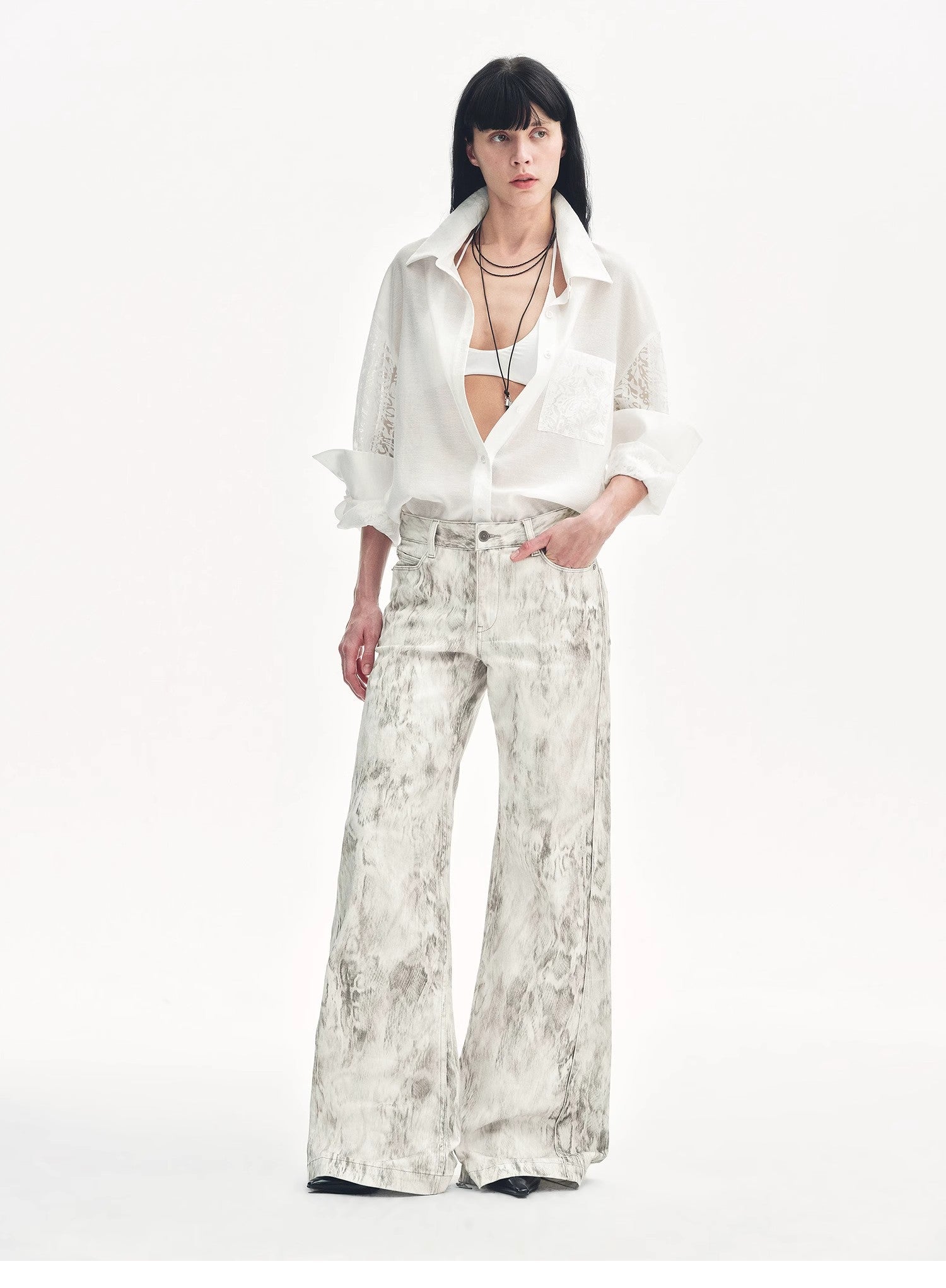 "Phantom" original snake print flared denim trousers-0