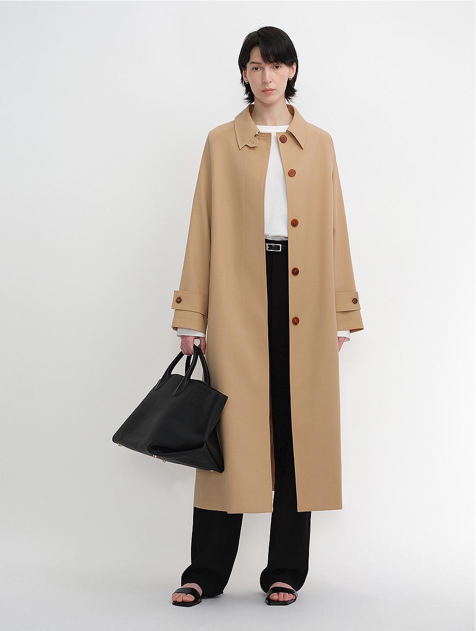 Firelady Sheepskin wool coat from Maison Beaumont, shown in a stylish, fitted design with a smooth wool texture.