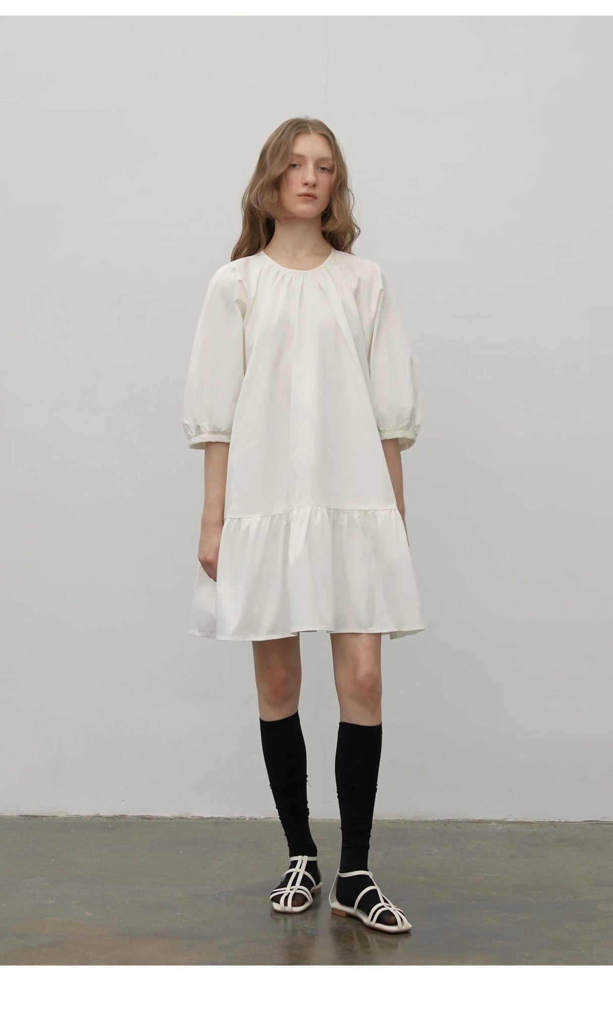 White Dream Island Dress by Firelady Fur featuring high-end puff sleeves and a Hepburn-style design for women.