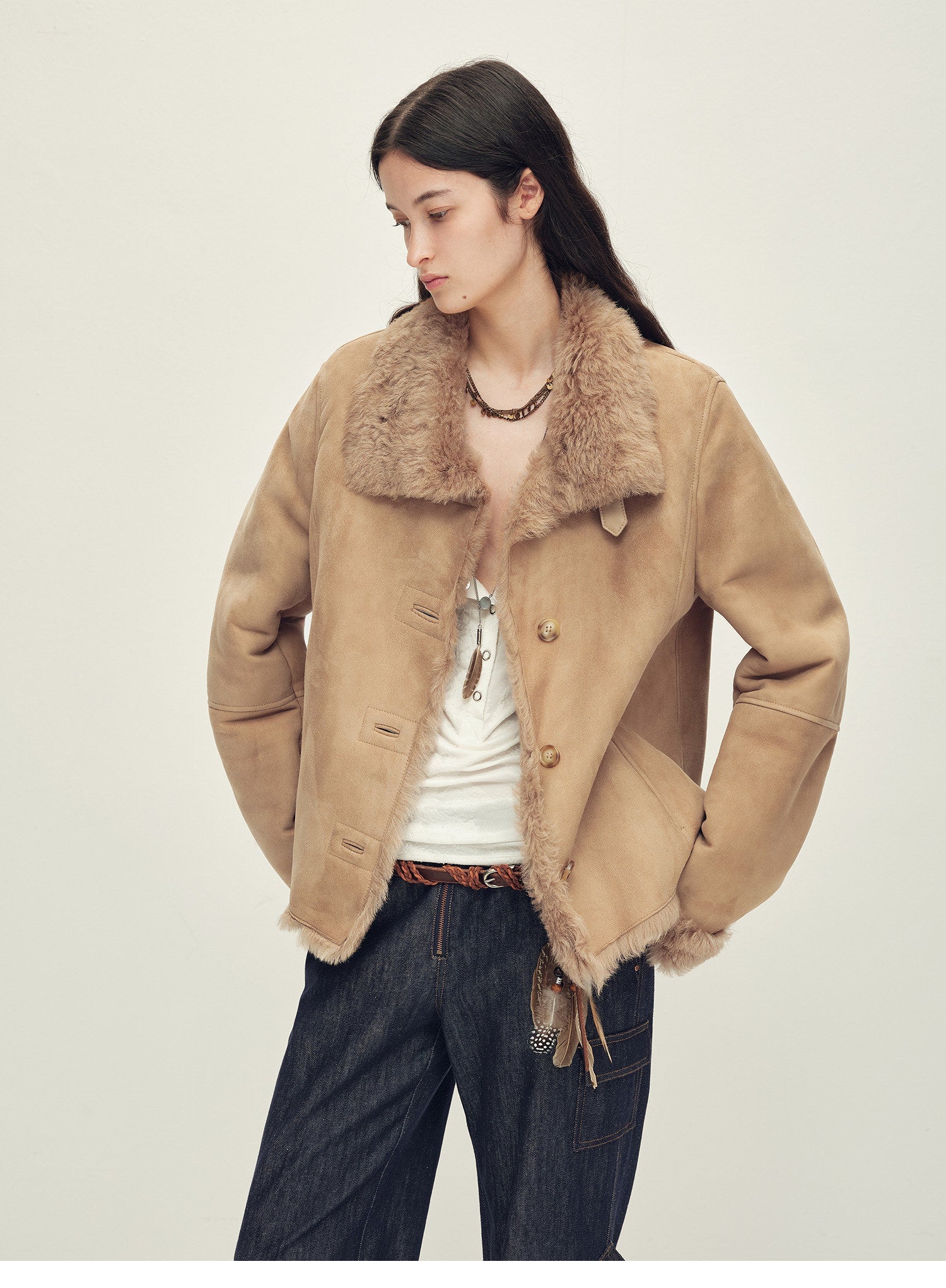 Women’s shearling suede coat by Firelady Fur, featuring Italian contrast suede and Tuscan shearling for winter warmth.