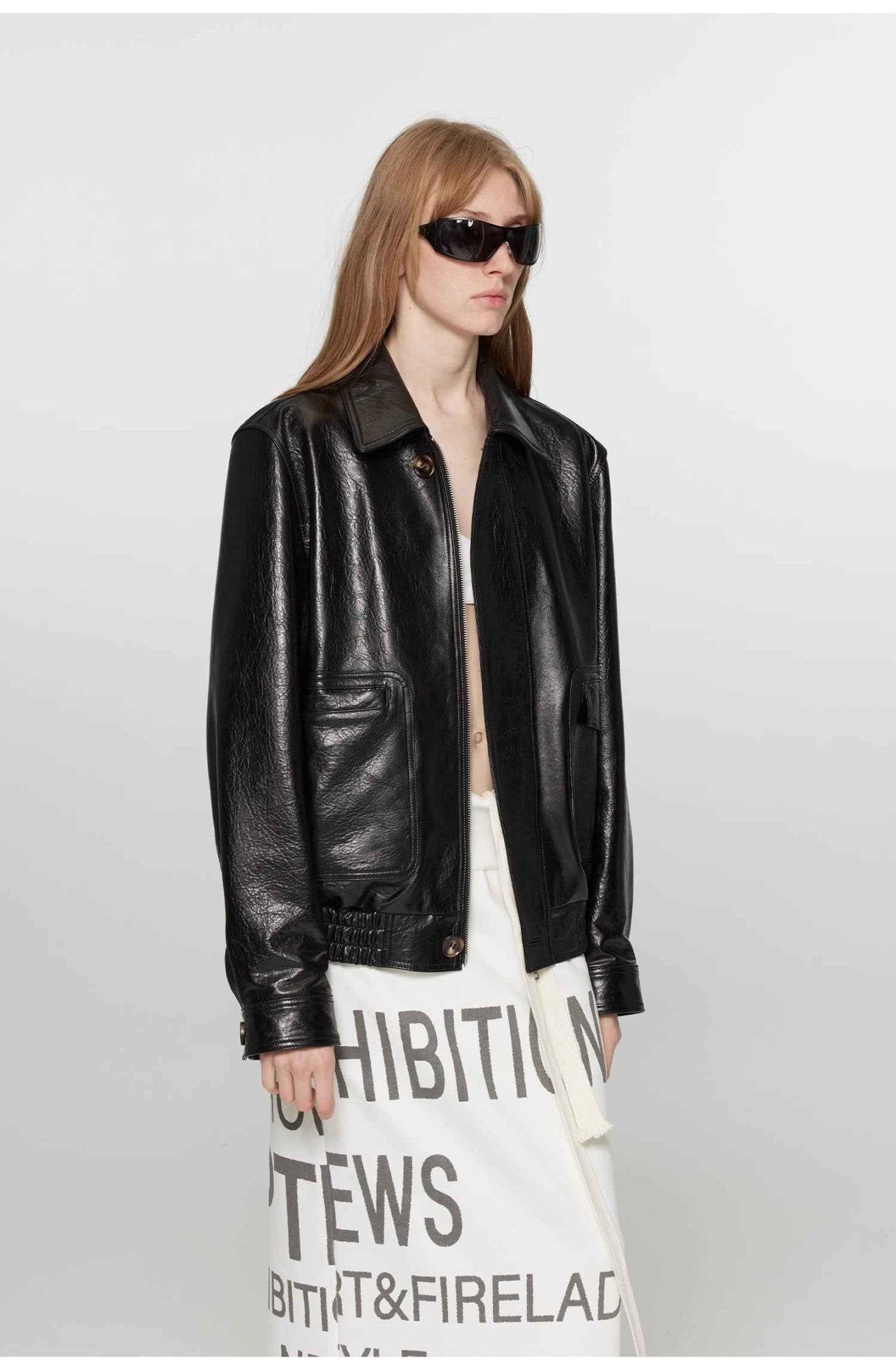 Vintage brown leather jacket for women by Firelady Fur, aviator style with classic details and a worn-in leather look.