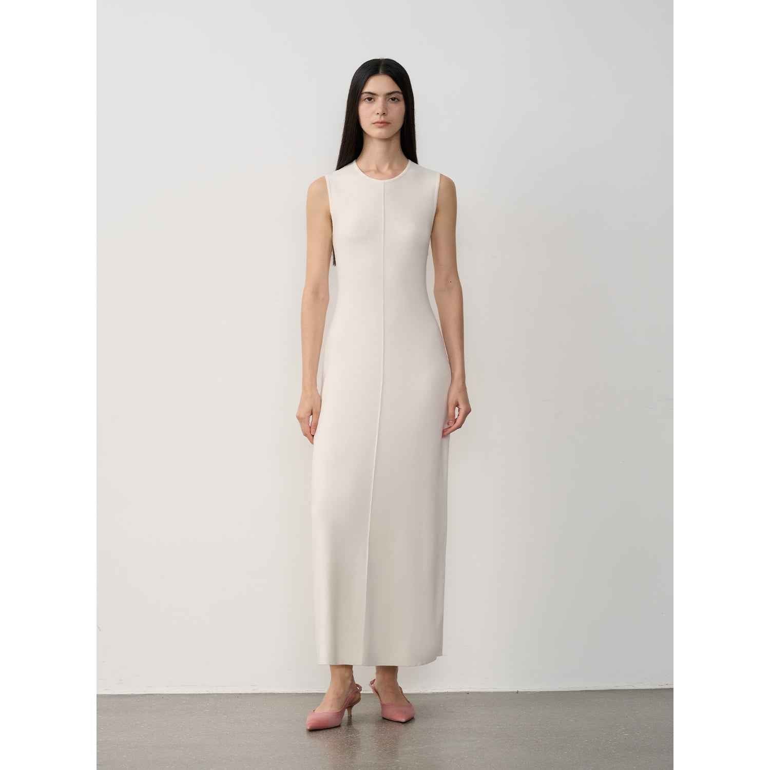 Firelady Fur women’s merino wool knit dress featuring a fitted silhouette and island-inspired letter pattern.