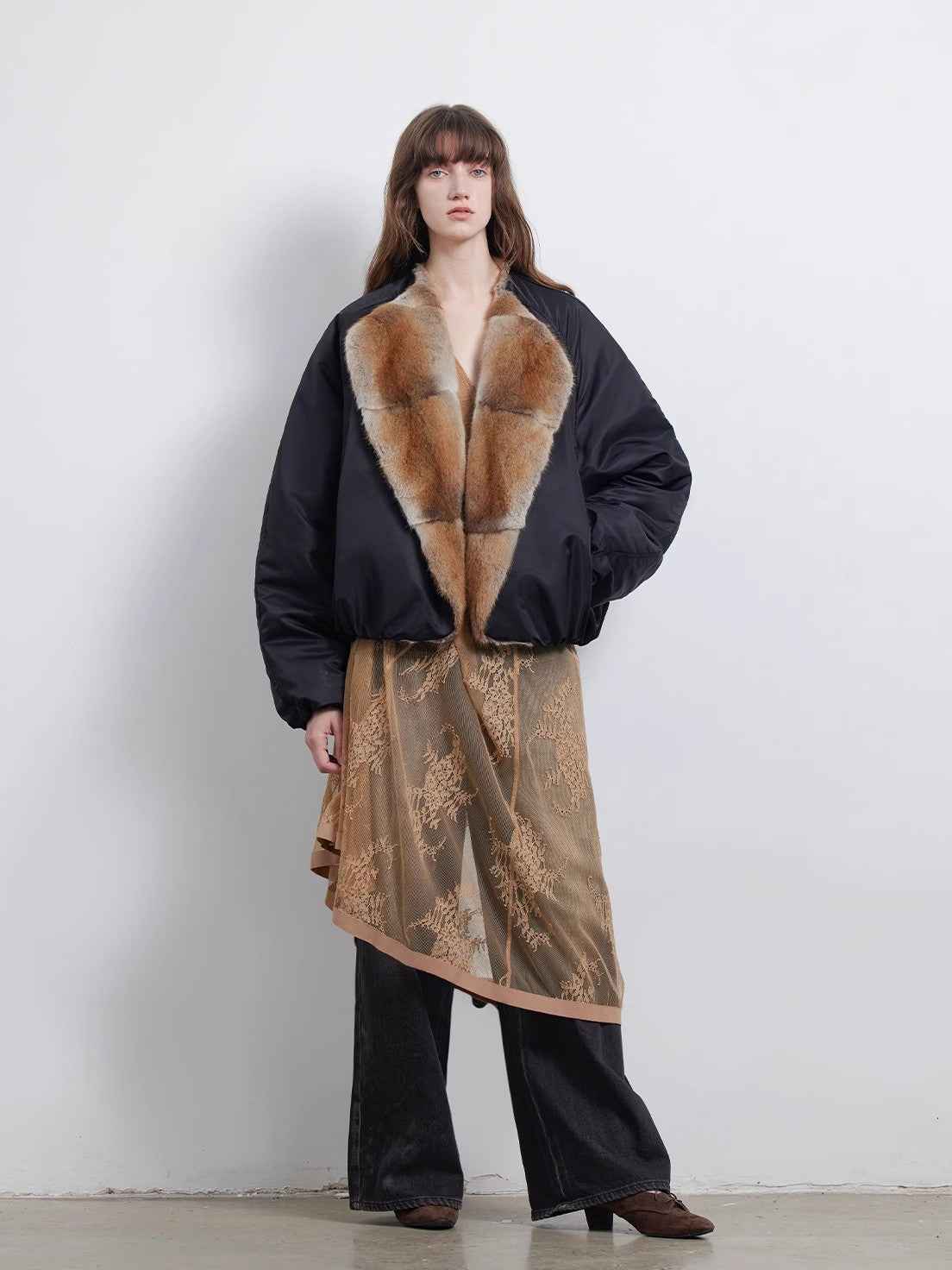 Women's short colorblock parka by Firelady Fur with sable muskrat fur collar and goose down insulation.