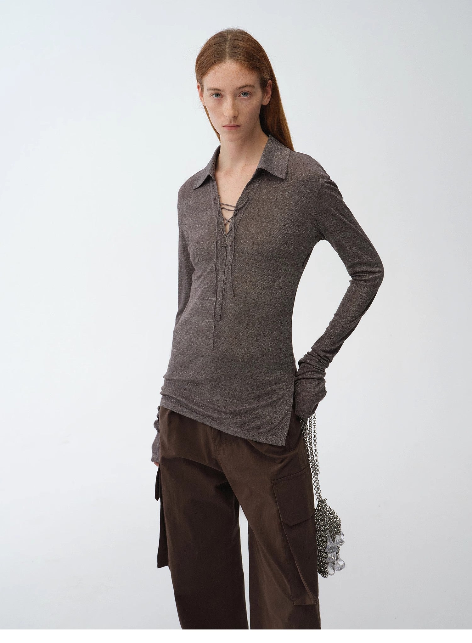 Light silver silk knitted top by Firelady Fur featuring a slim fit, long sleeves, tie lapel, and slightly transparent fabric.