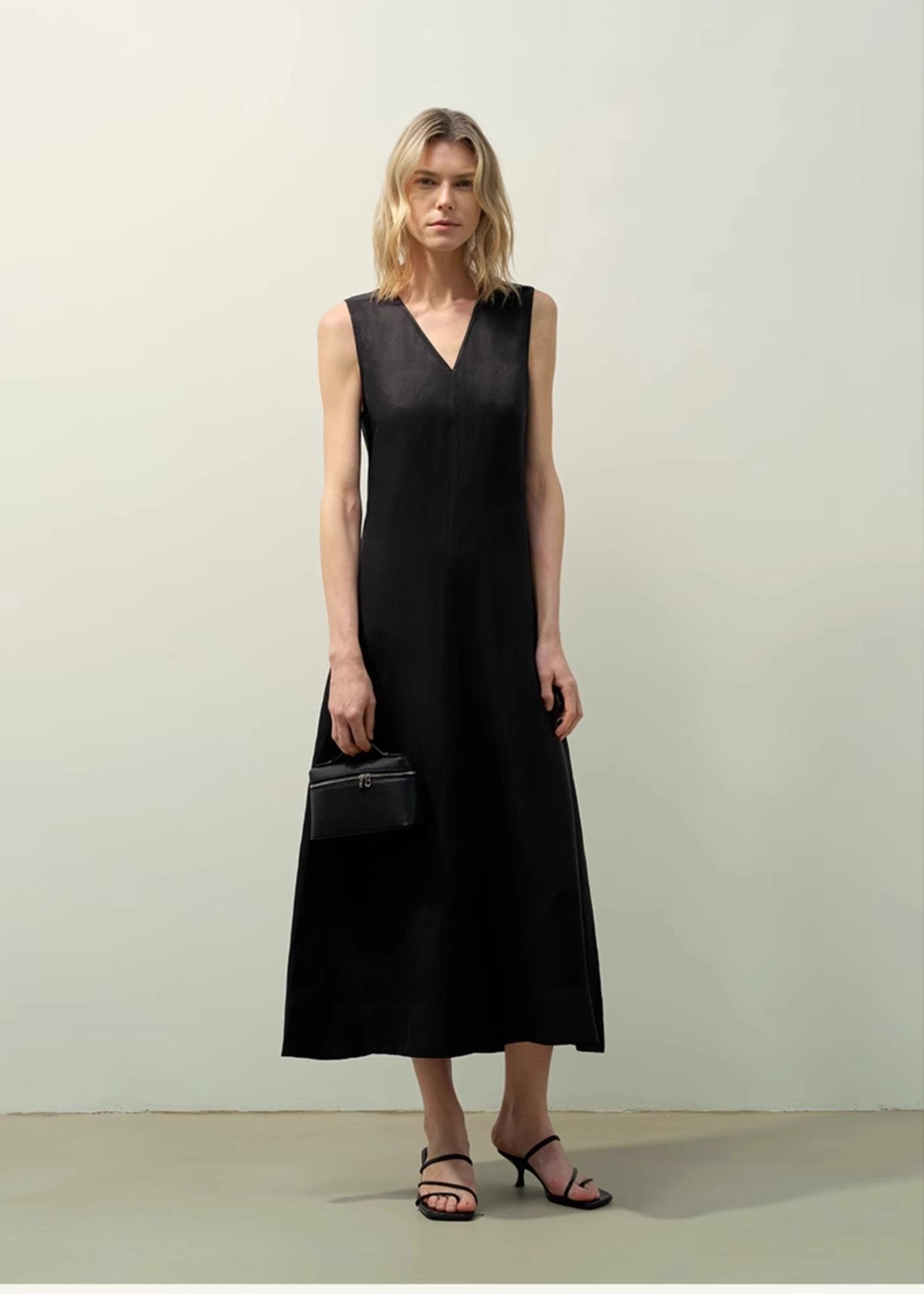 Firelady Fur women's sleeveless V-neck A-line dress with lightweight, textured cupro linen fabric and anti-wrinkle design.