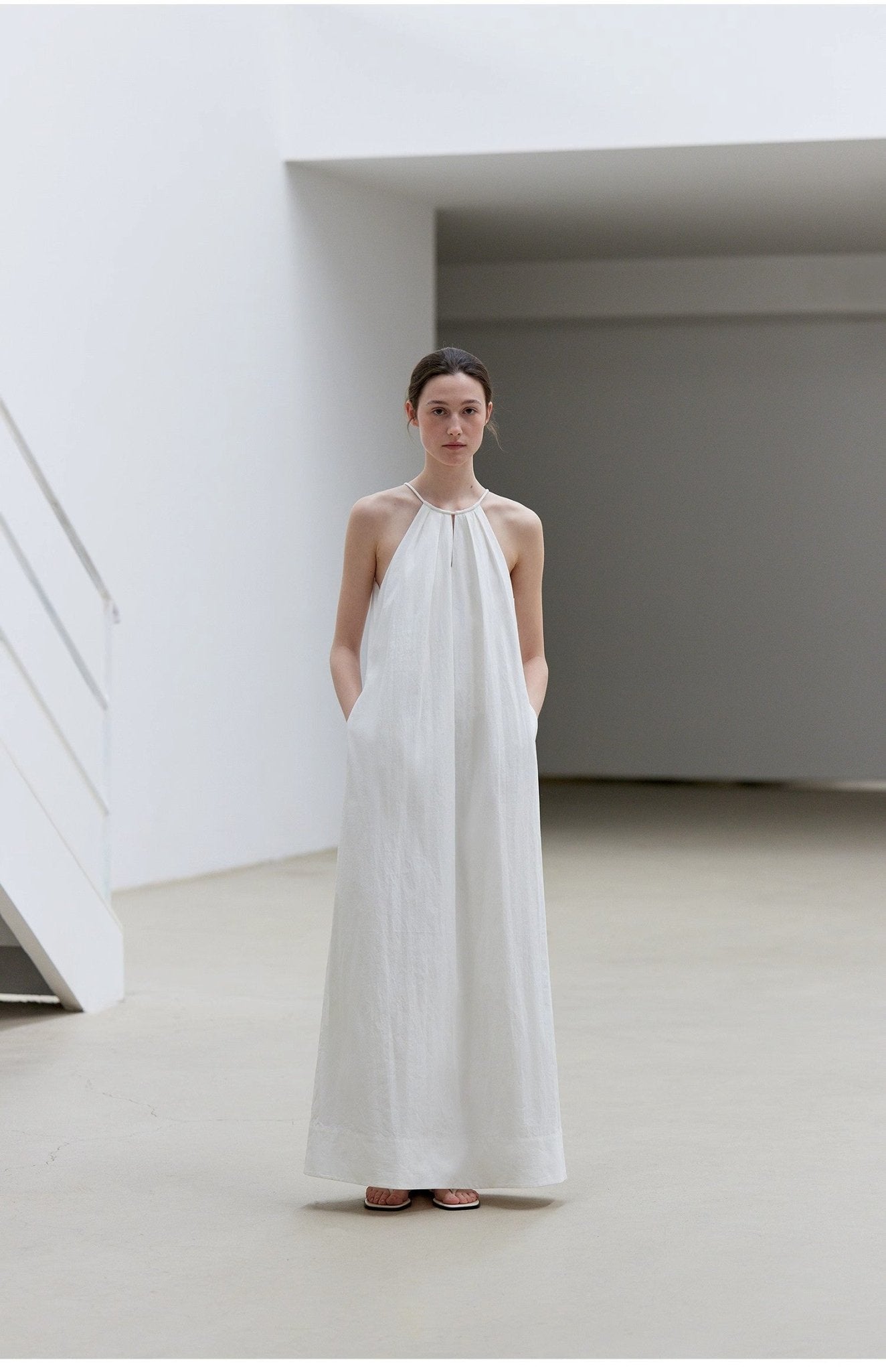 Minimalist Rule Dress by Firelady Fur featuring a halter neck and hollow design, ideal for women's summer long dress styles.