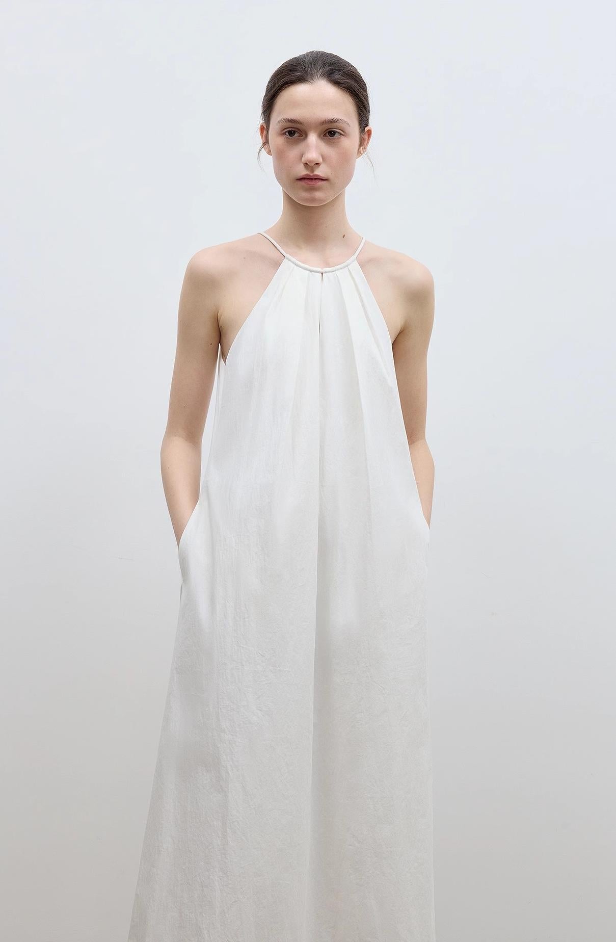 Firelady Fur minimalist Rule dress featuring a halter neck and hollow design, perfect for summer women's fashion.