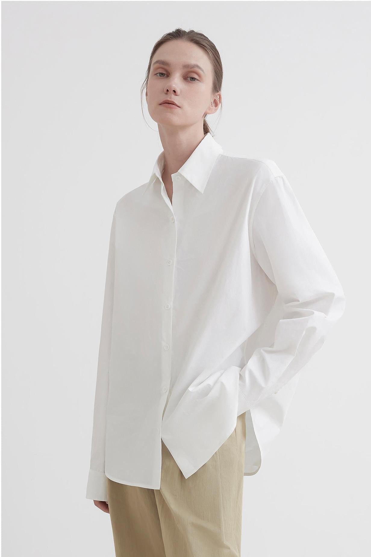 Firelady Fur Independence Song blouse featuring a plaid pattern, long sleeves, and a stylish, high-end design.