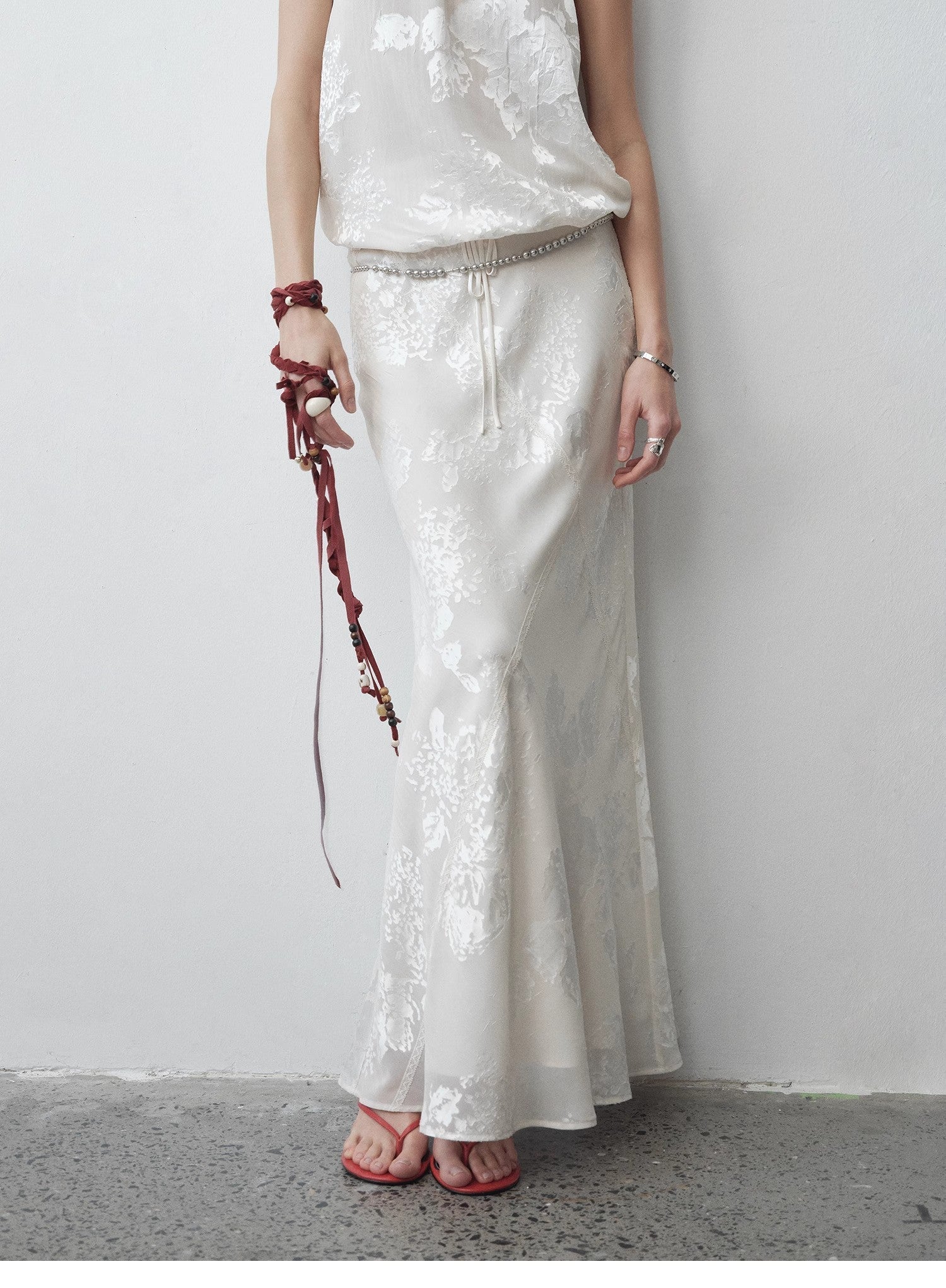 Firelady Fur Seville Bias-Cut Fishtail Midi Skirt in burnt pattern, showcasing its flowing silhouette and stylish design.