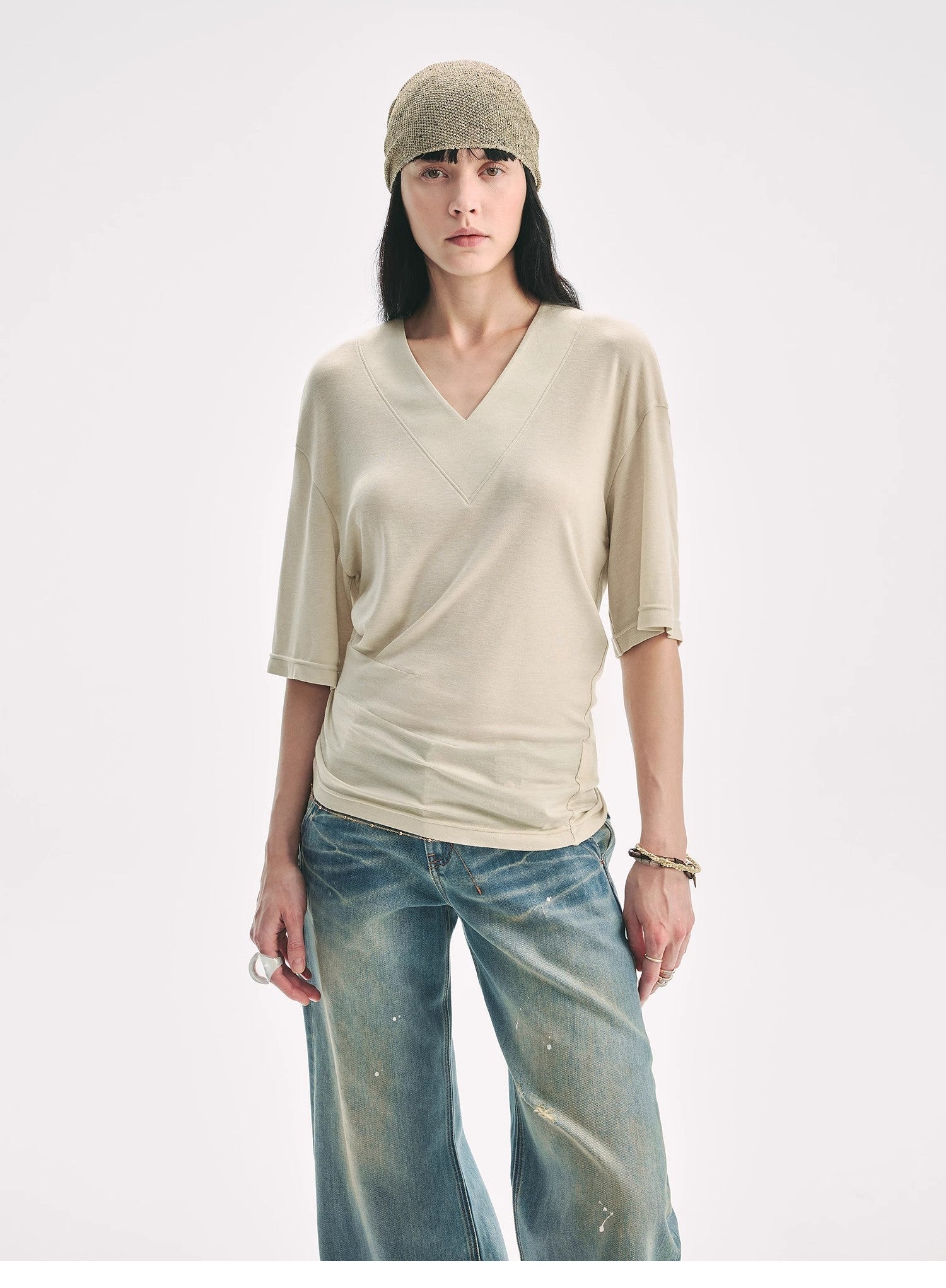 Women's Silk Tencel V-Neck Pleated T-Shirt by Firelady Fur with loose fit and dropped shoulders, showcasing elegant fabric and design details.