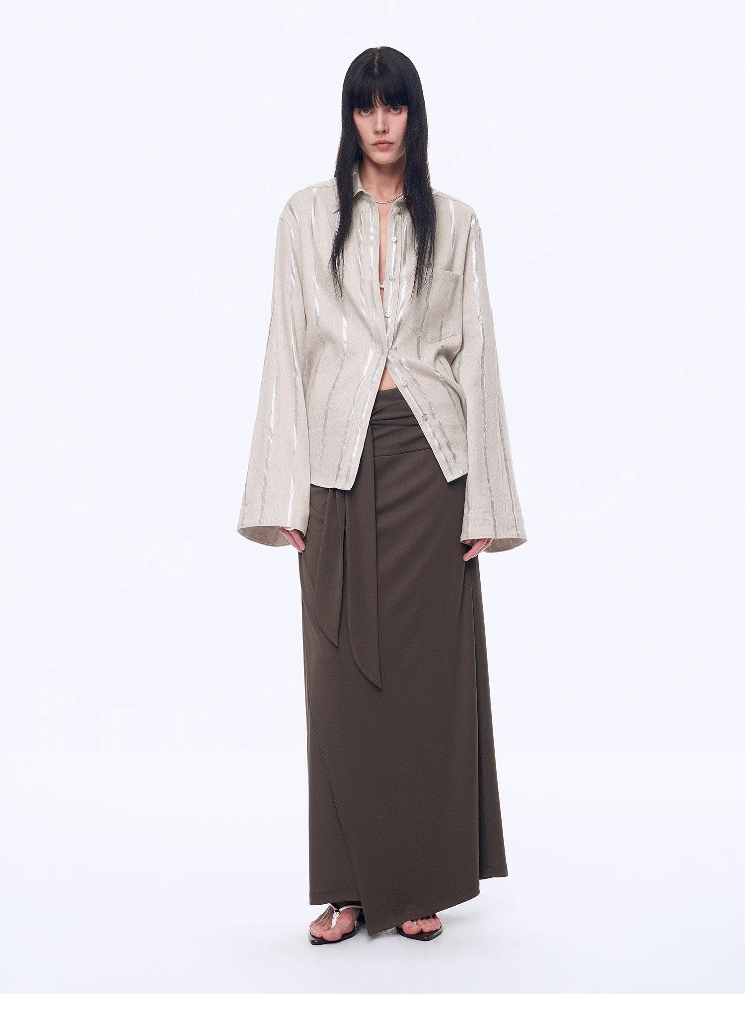 Silver stripe linen cropped shirt with trumpet sleeves by Firelady Fur, styled as a casual top with a modern, chic look.