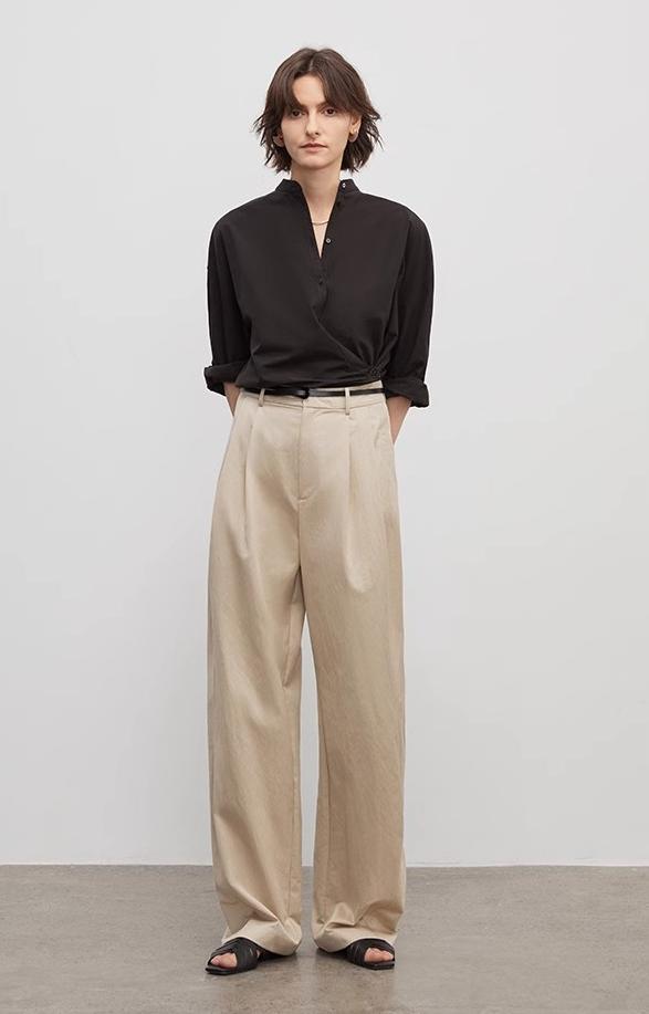 Wide-leg trousers for women by Firelady Fur, featuring a double-pleat design and straight-leg style.