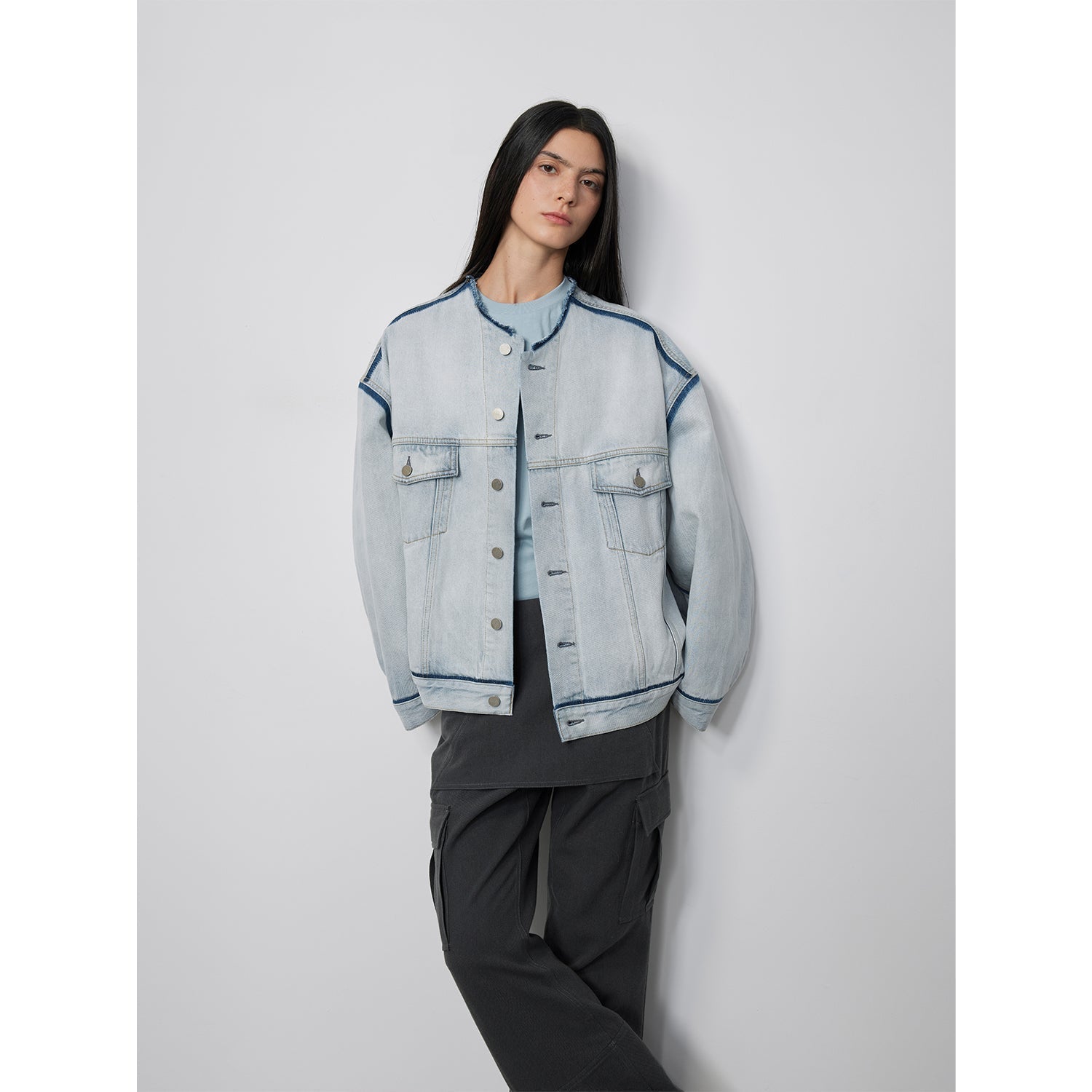 Women's denim jacket by Firelady Fur with raw edge collarless design, washed cotton fabric, and starry sky-themed details.