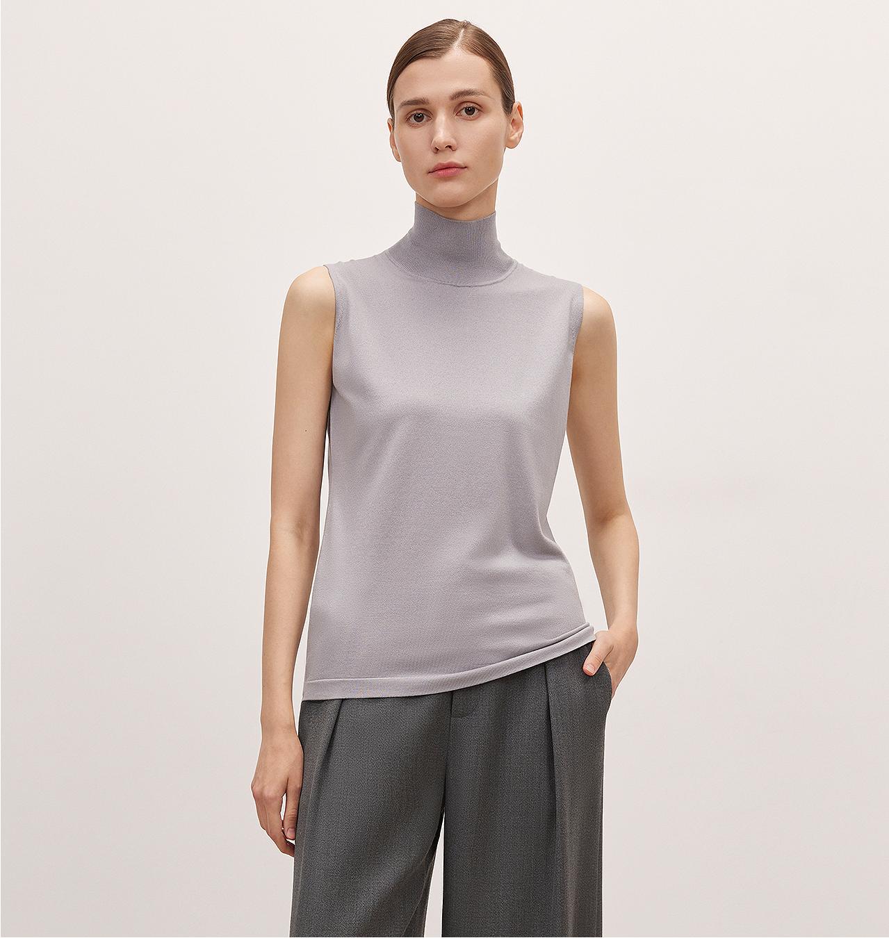 Firelady Fur sleeveless vest with high collar, knitted from triacetate and Tencel, showcasing a soft, textured fabric.