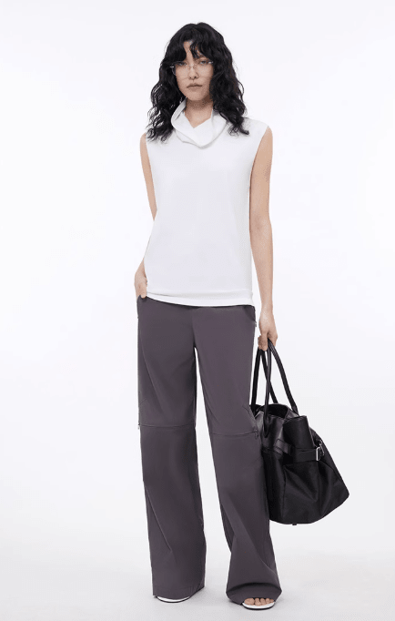 Firelady Fur sleeveless knitted vest with high collar, made from triacetate and Tencel blend, showcasing a stylish, textured fabric.