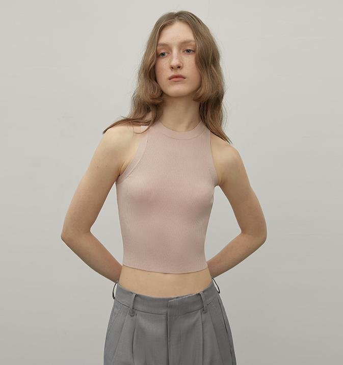 Knit sleeveless top by Firelady Fur, Maison Élvorain, featuring a cozy, fitted design with a sleeveless silhouette for women's fashion.