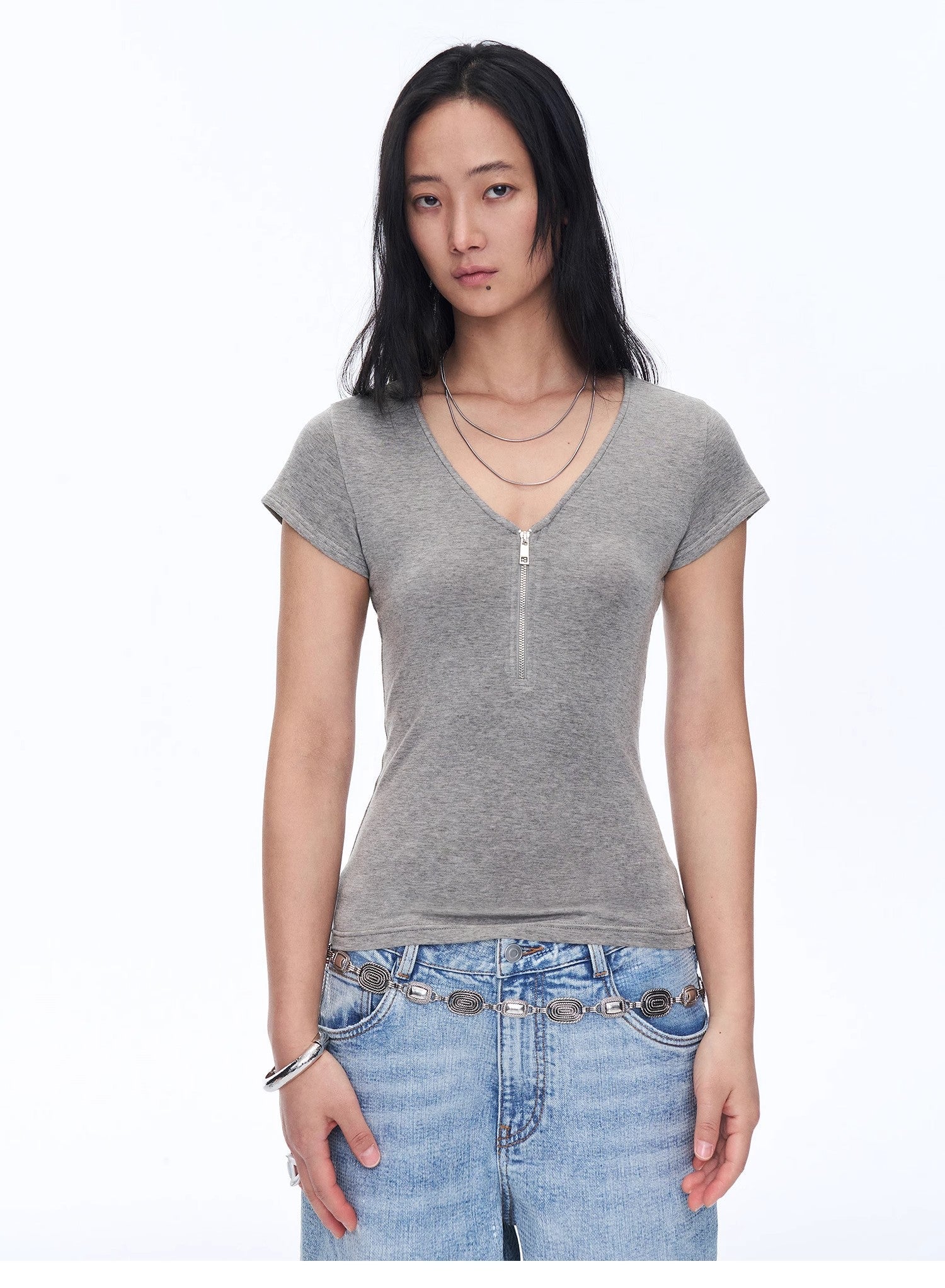 Firelady Fur Wool Tencel deep V-neck women's top with short sleeves, loose fit, zipper front, in a simple, solid color.