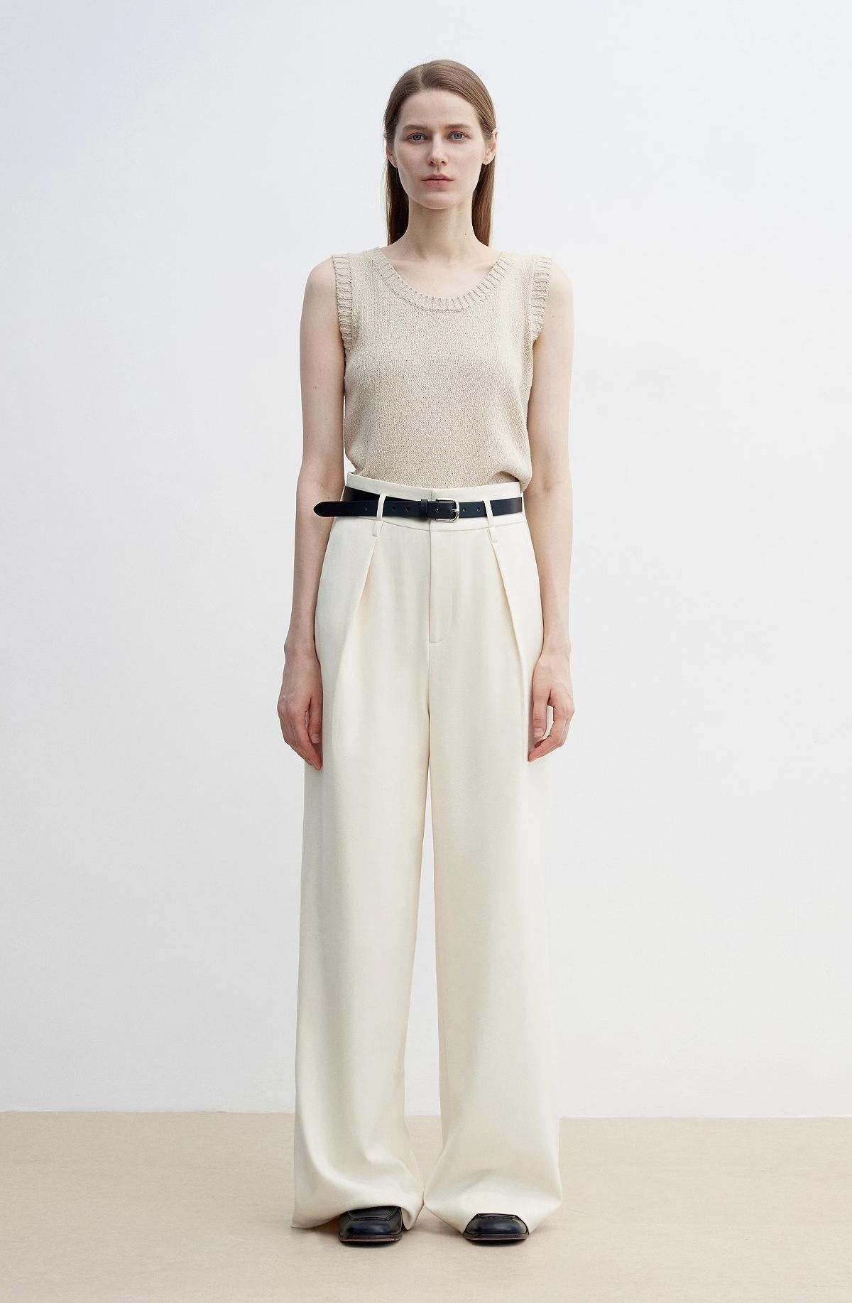 White women's wide-leg casual pants with a high waist, draped fit, and floor-length design by Firelady Fur.